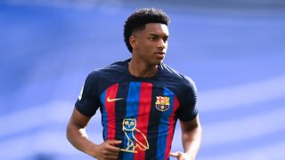 MADRID, SPAIN - OCTOBER 16: Balde of FC Barcelona looks on wearing the modified OVO owl logo on the front of the FC Barcelona shirt, which celebrates Canadian musician Drake surpassing 50 billion streams on Spotify during the LaLiga Santander match between Real Madrid CF and FC Barcelona at Estadio Santiago Bernabeu on October 16, 2022 in Madrid, Spain. (Photo by David Ramos/Getty Images)